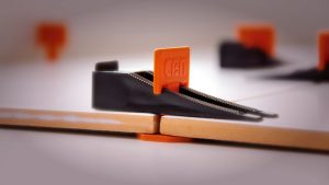 Как добиться идеальной укладки плитки: секреты работы с системой выравнивания плитки